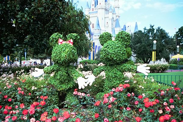 Minnie and Mickey in front of Cinderella Castle